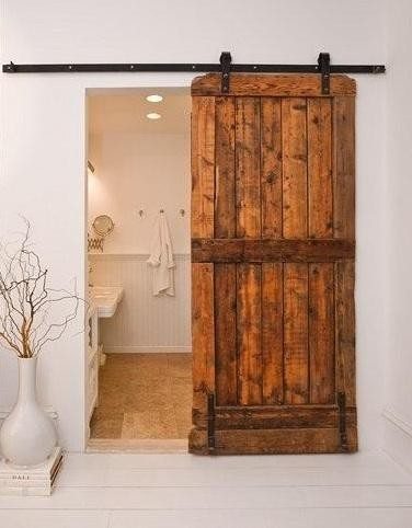 Another idea for repurposing old rustic doors is using two as 