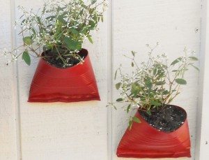 http://www.diyinspired.com/wp-content/uploads/2016/04/Recycled-Tin-Cans-Become-Flower-Pots-300x229.jpg