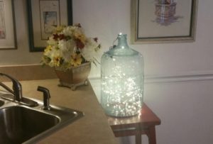 http://www.diyinspired.com/wp-content/uploads/2016/06/Upcycling-an-Old-Glass-Water-Bottle-300x203.jpg