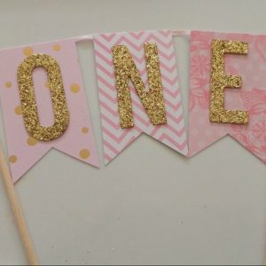 pink-and-gold-glittered-first-birthday-cake-topper